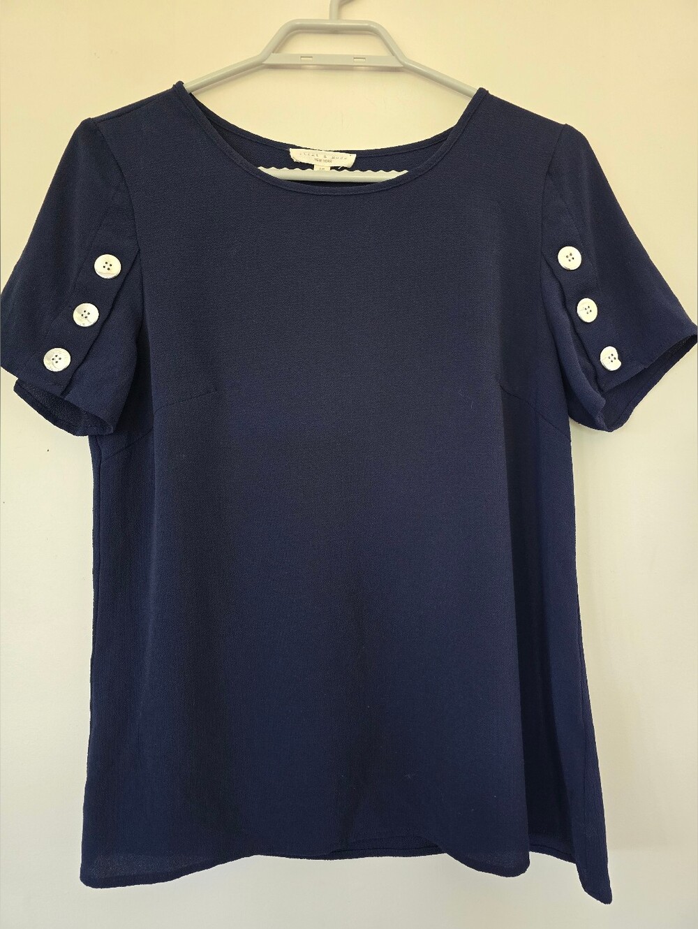 Women’s Navy Short Sleeve Top with Button-Sleeve Detail. Size Small.